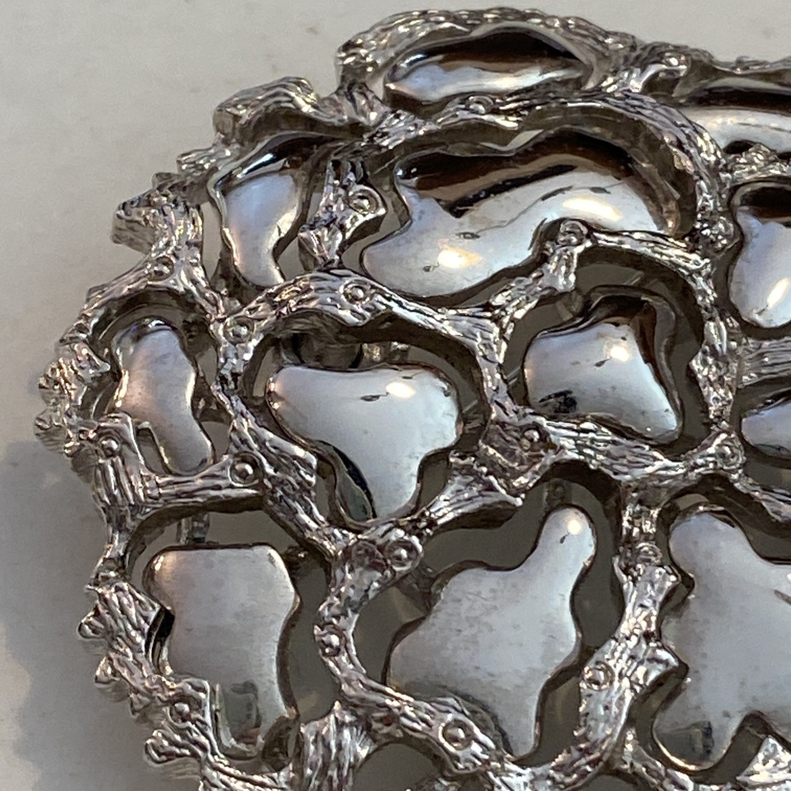 Vintage Roget TM Silver Tone Metal Modernist Perforated Pattern Branch Shiny Pin