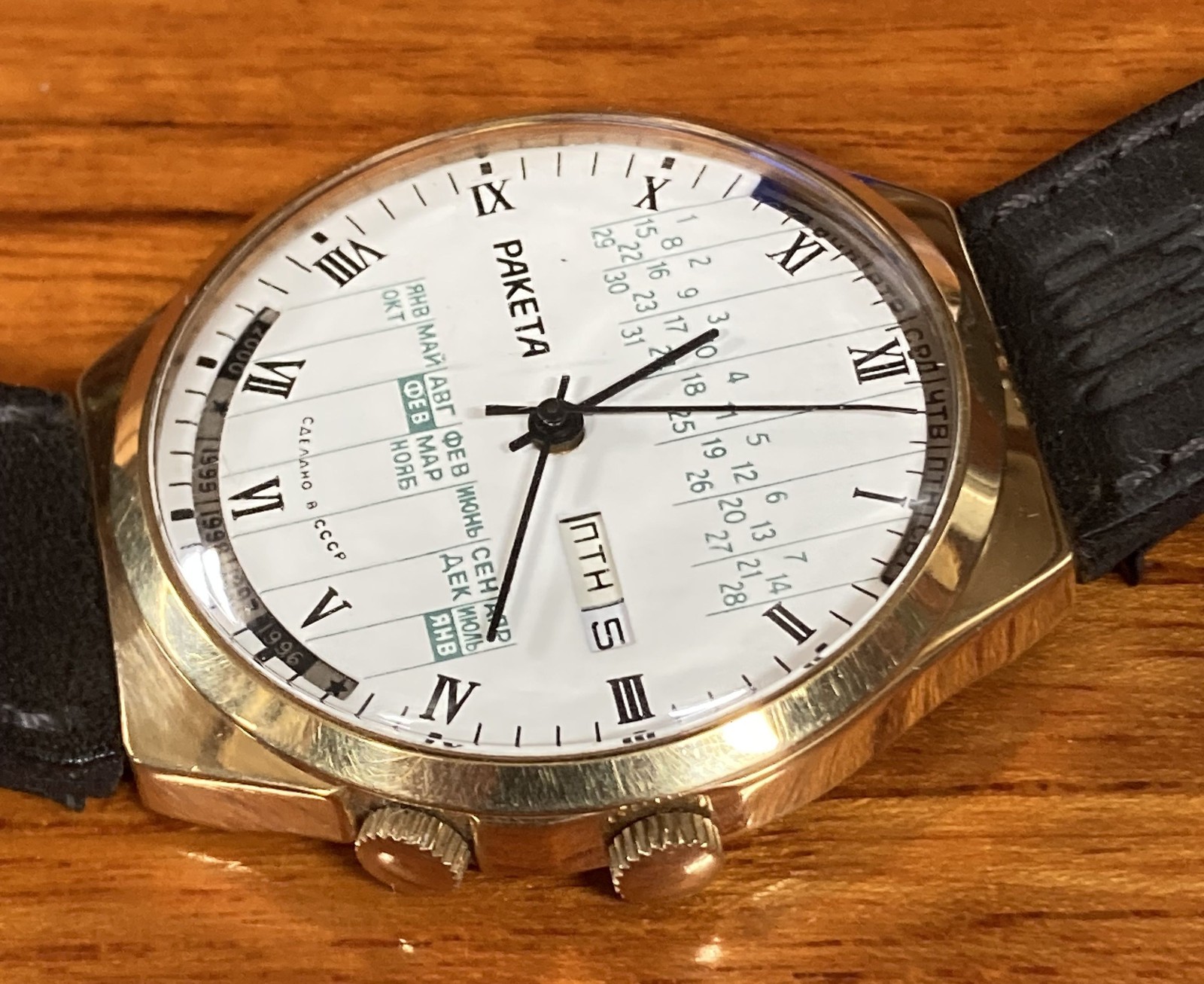 Raketa perpetual calendar watch from USSR, with leather band stamped “CCCP”