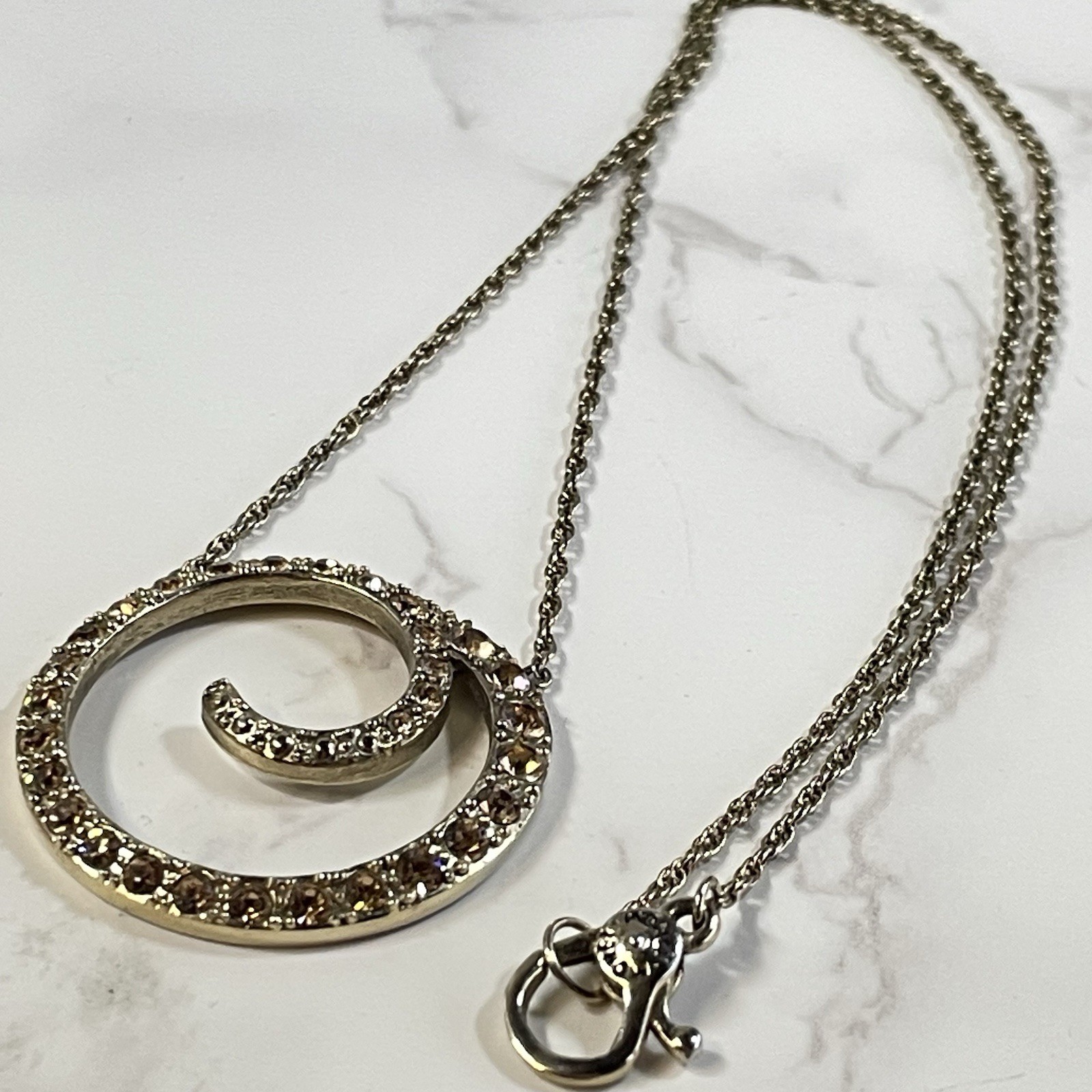 Vintage Monet Gold Tone Topaz Rhinestone Swirl Circle Pendant Necklace Chain 16″