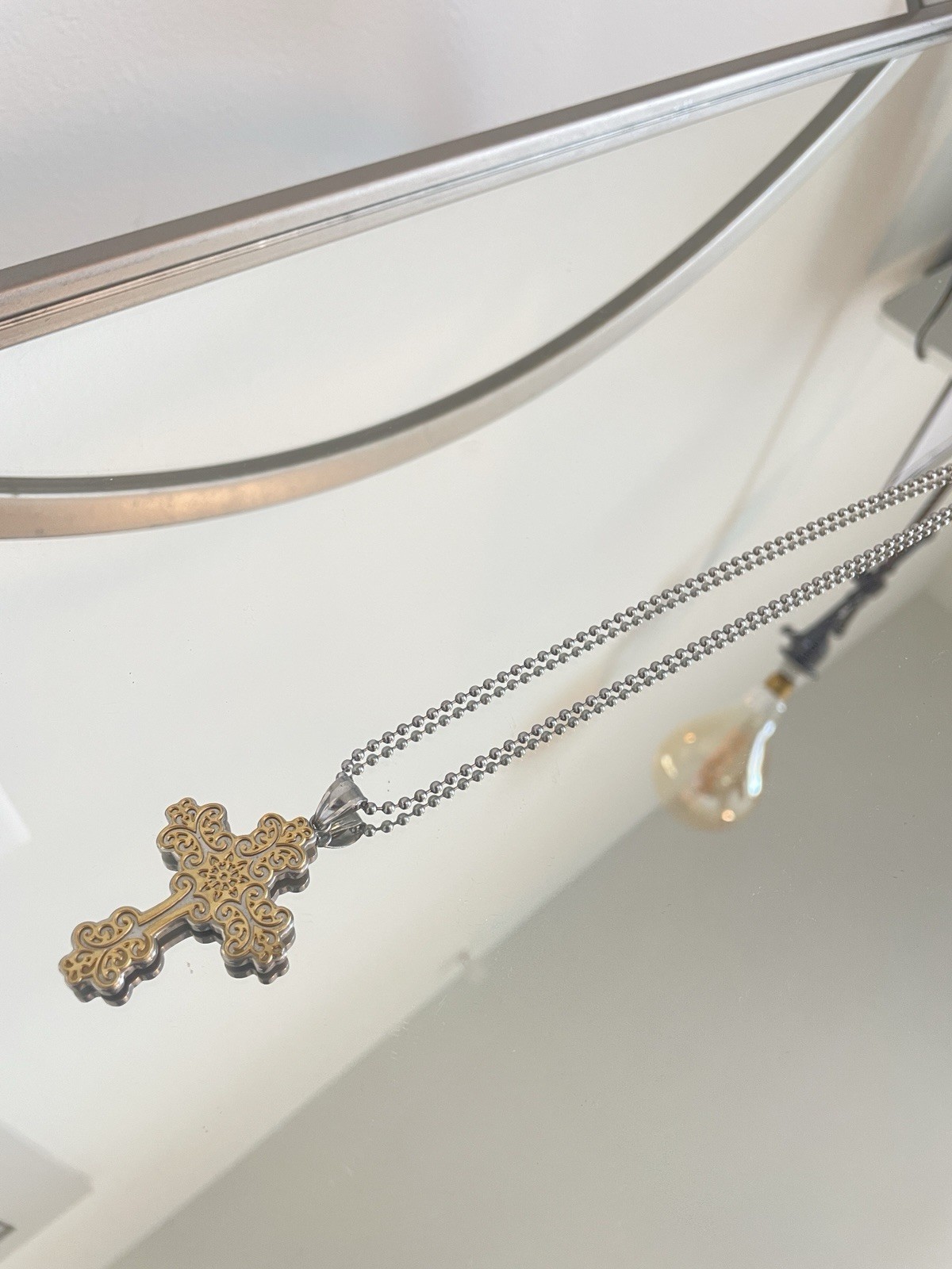 Silver Tone Metal Ball Chain Necklace with Gold Tone Filigree Cross Pendant