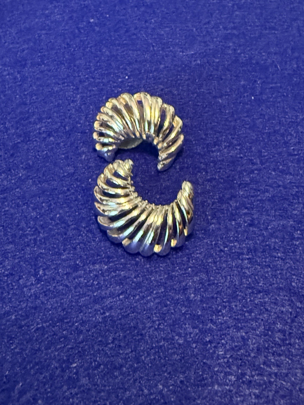 Vintage Monet signed Silver tone ribbed crescent post back earring