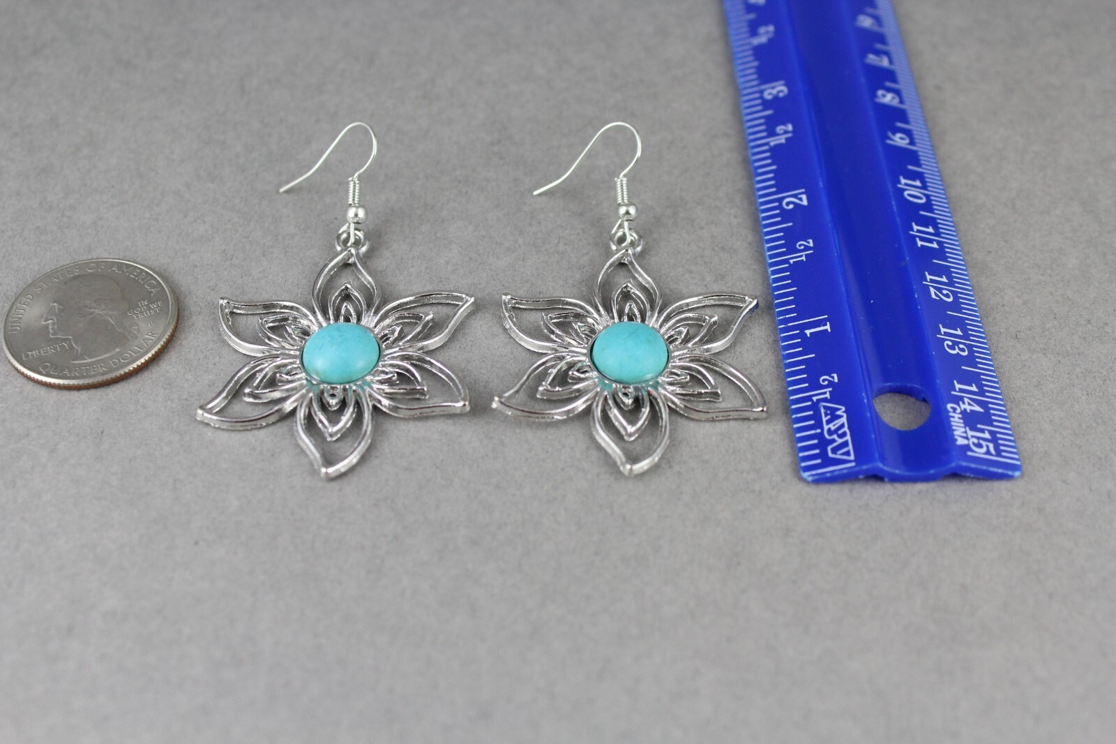 turquoise silver earrings lightweight flower outline dangle 2 3/8 long stamped