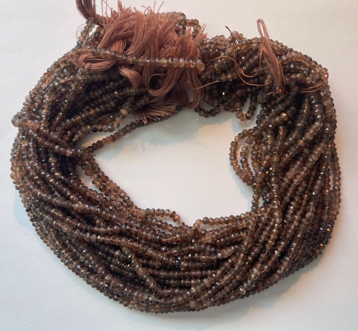 ONE STRAND ANDALUSITE 3.75 MM FACETED RONDELLES STRAND IS 13.75″ BELOW WHOLESALE