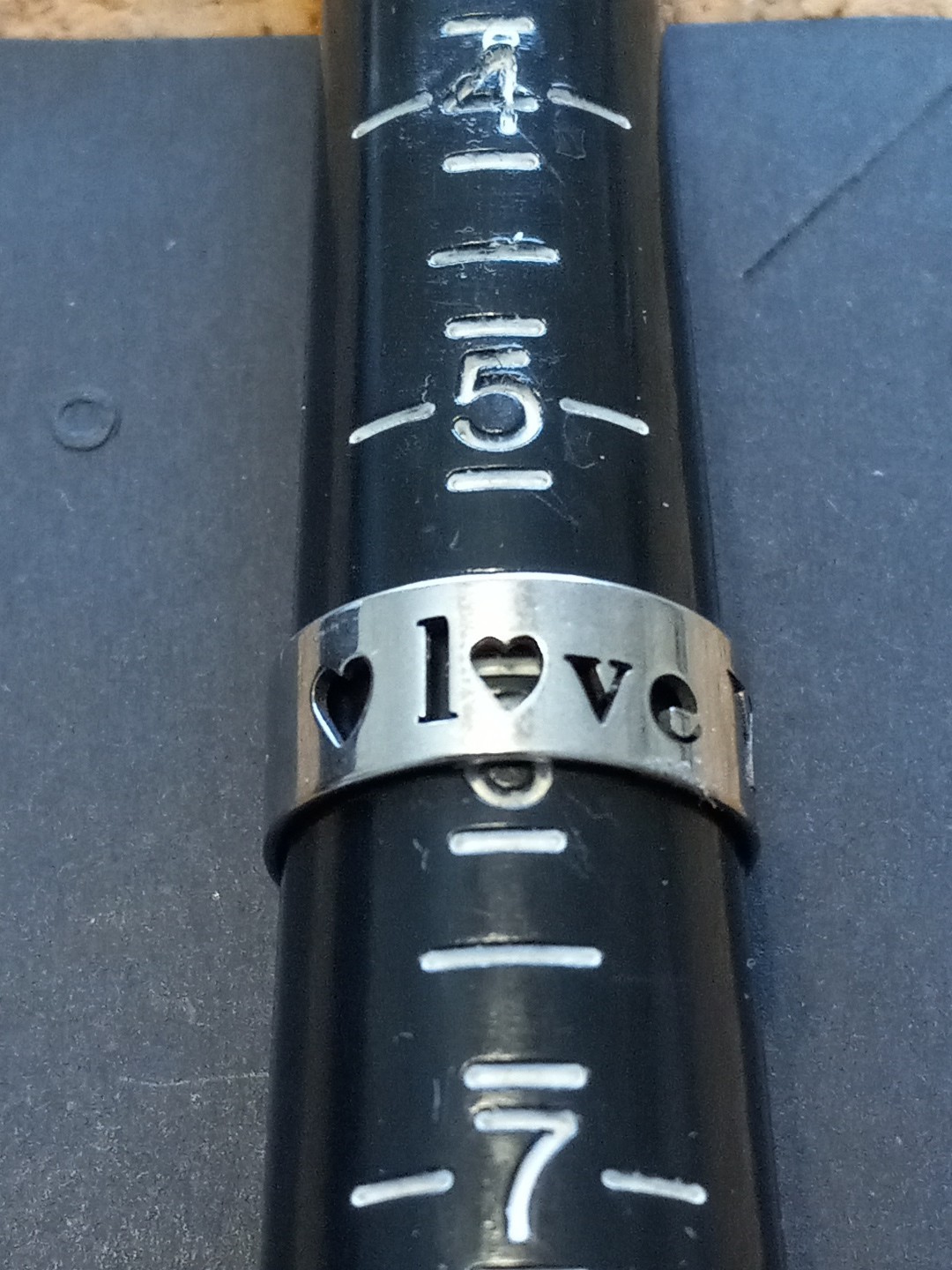 Stainless Steel Fashion Ring – Stamped Love You. 7mm Wide. Size 5.5 (B20)