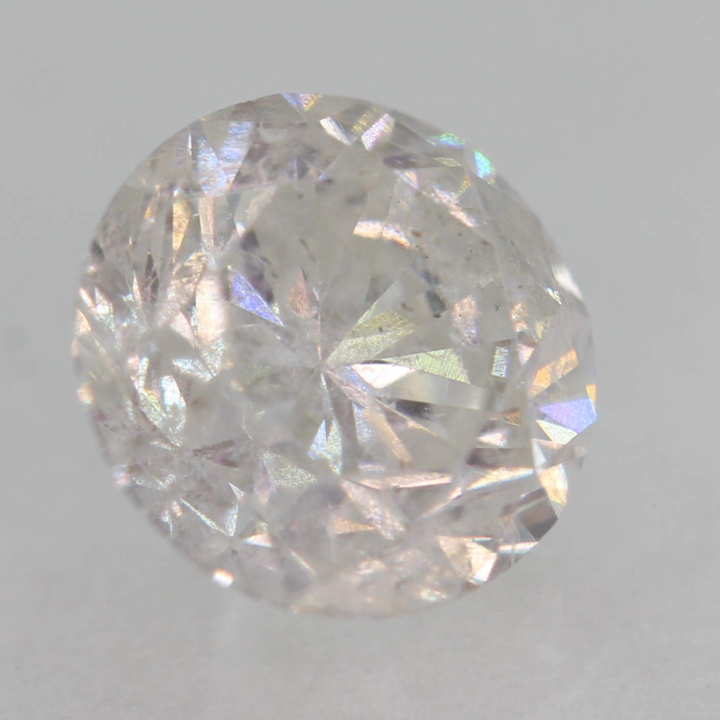 Certified 0.65 Carat E SI2 Round Brilliant Natural Enhanced MINED Diamond 5.37mm