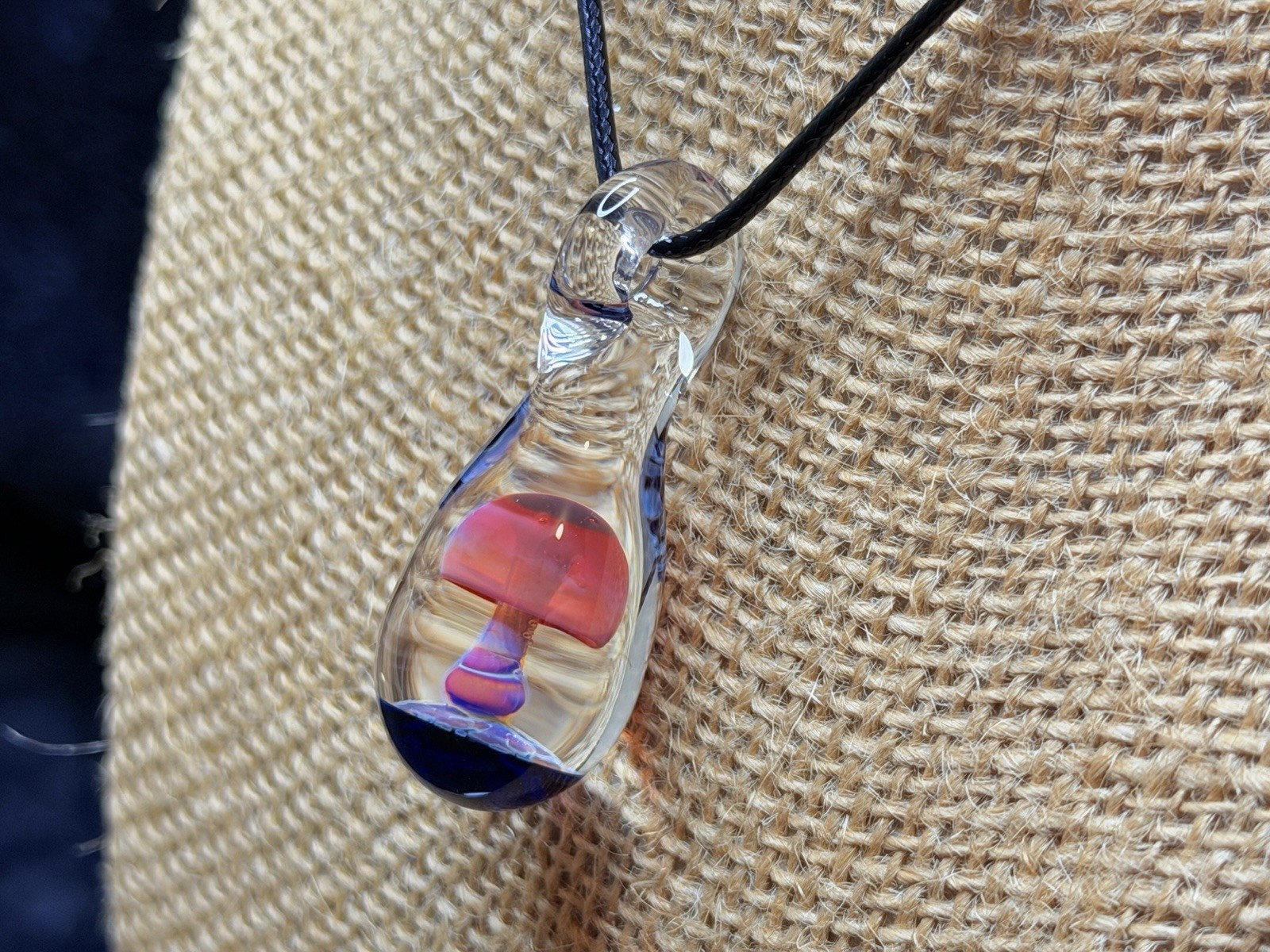 Glass Teardrop Mushroom Pendant in reds and purples with cobalt blue base