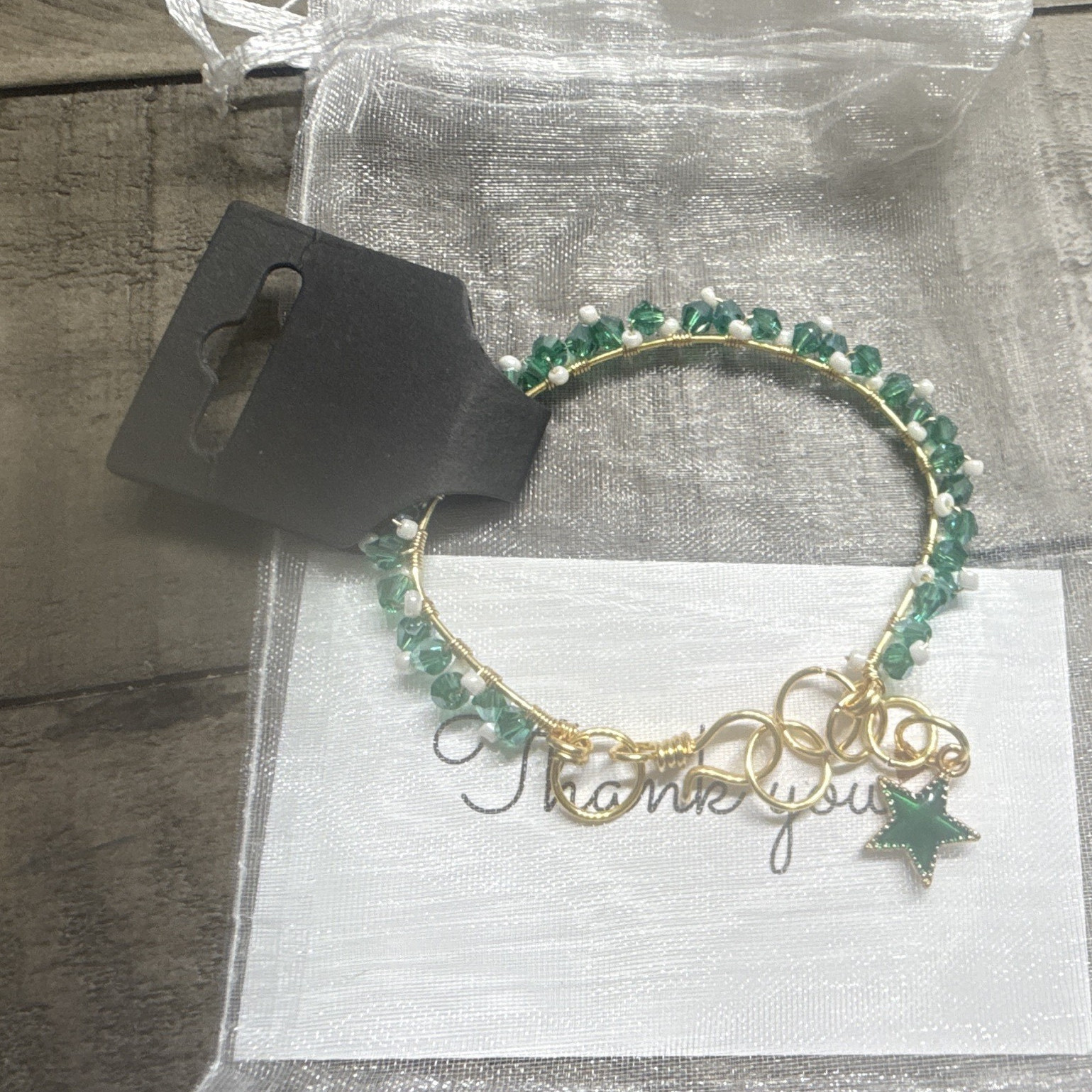 Gold Tone Wire Bangle Bracelet Green Crystal Bicone Beads Star Dangle Charm