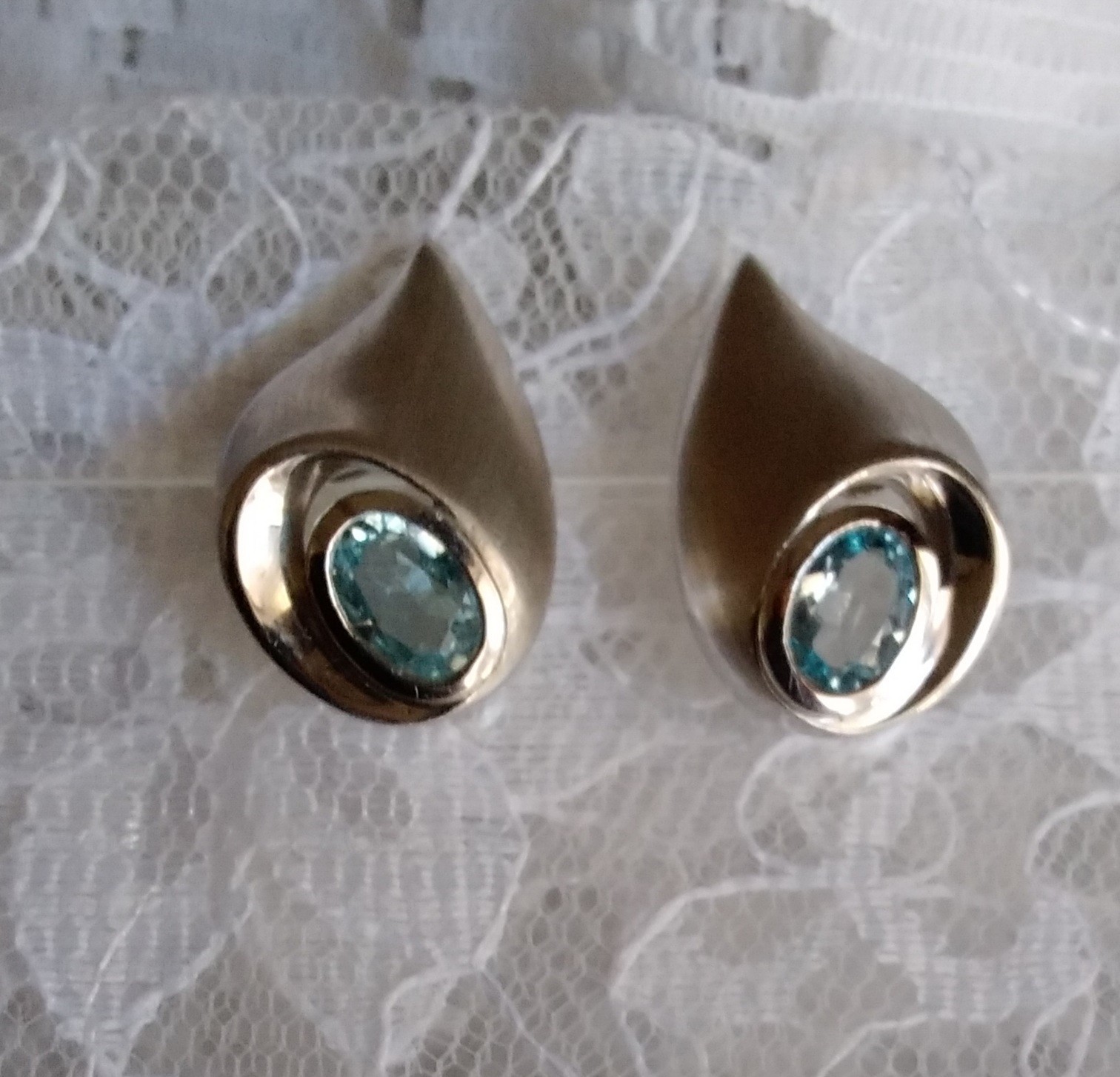 Unique Shape Blue Topaz Post Earrings Set In Satin Finish 925 Sterling Silver