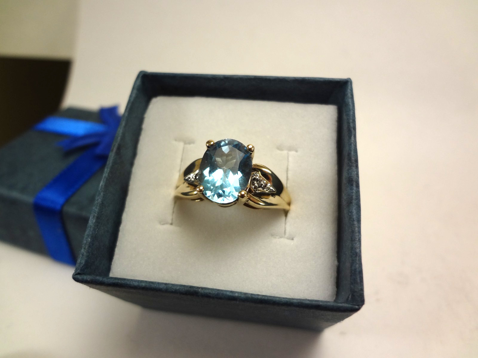 10K SOLID GOLD – SWISS BLUE TOPAZ AND DIAMOND RING – 3.10 GRAMS – SIZE 7.0 – F95