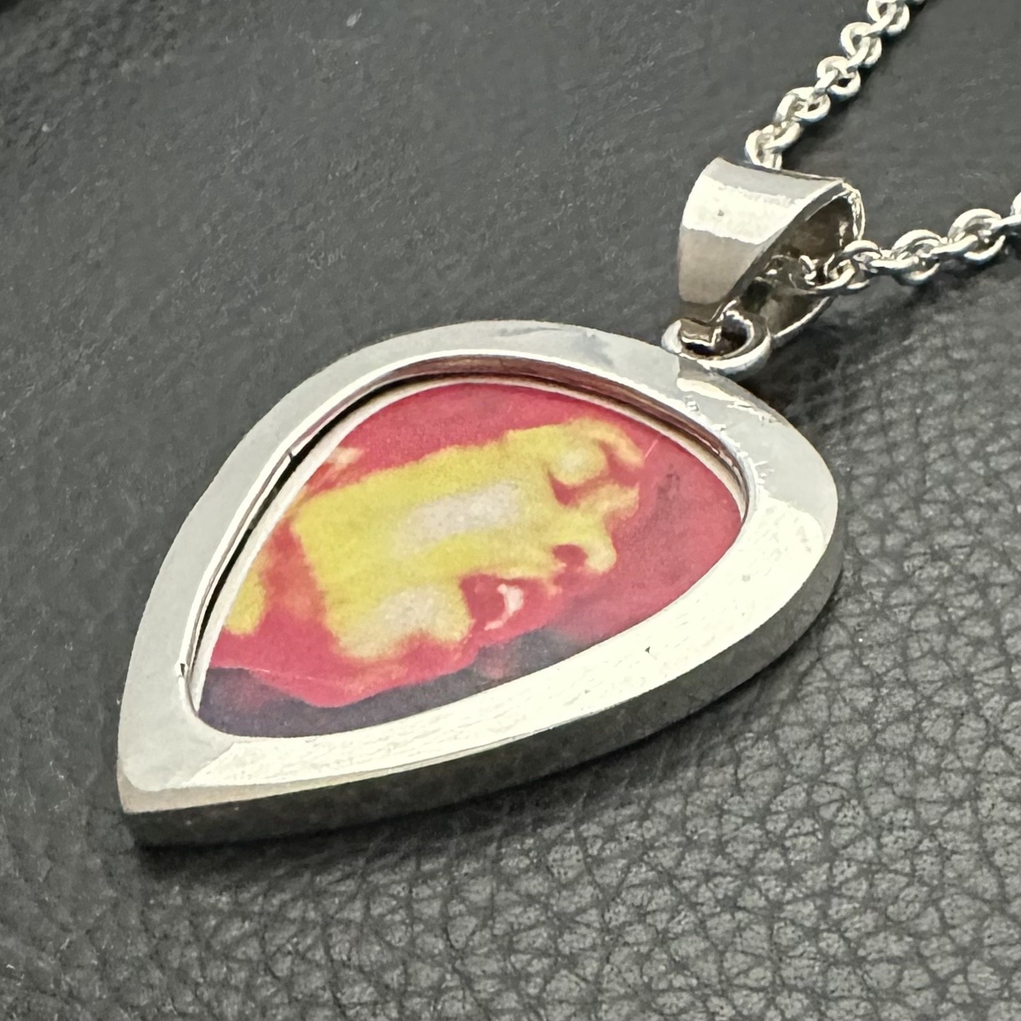 MJG STERLING SILVER. GUITAR PICK HOLDER/ PENDANT + CHAIN. JIMI. 12 GRAMS.
