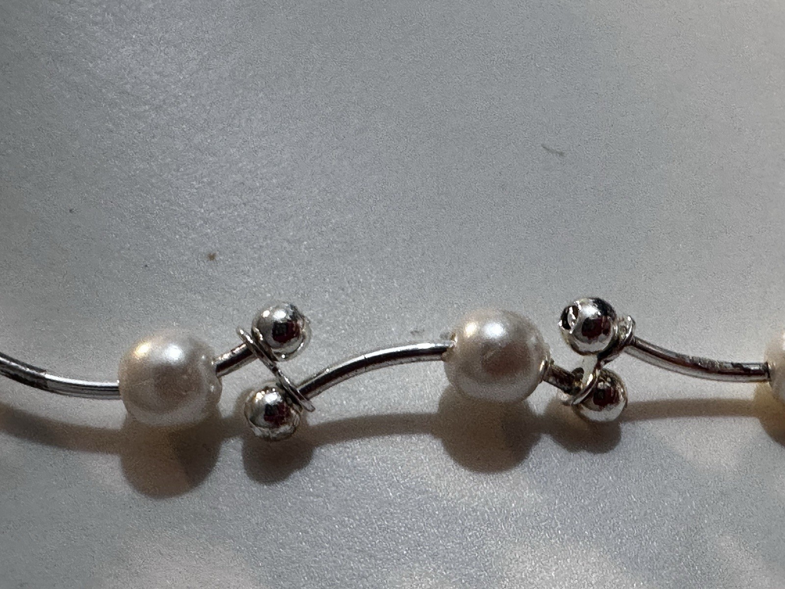 Elegant Twisted Faux Pearl Necklace with Silver-Tone Finish