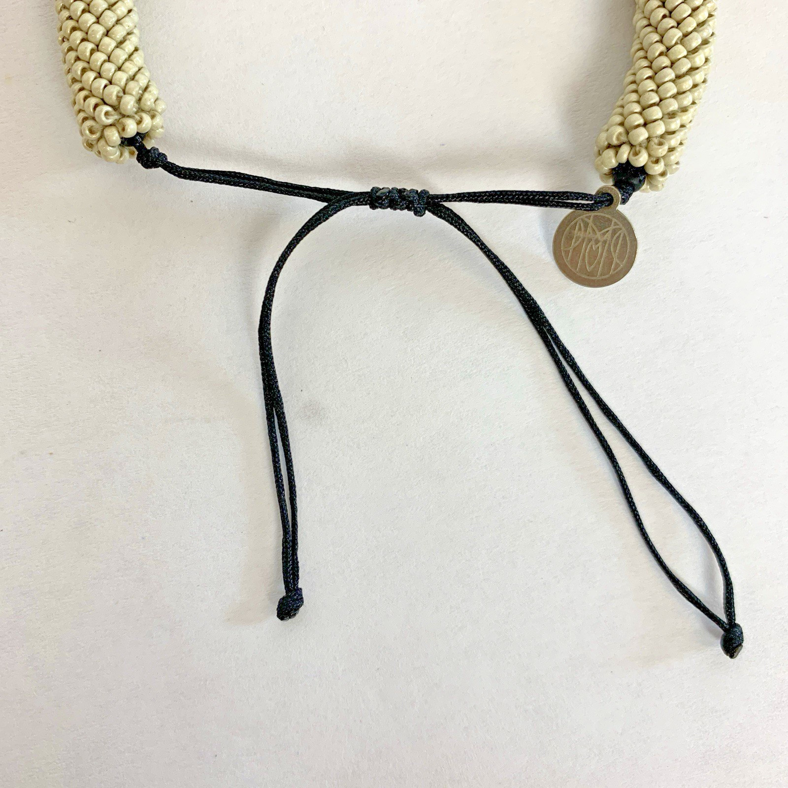Portomea Opus Mens Bracelet Sand White Beaded Drawstring Closure