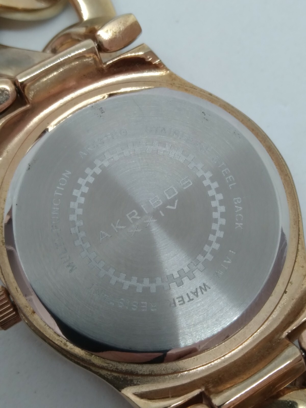 Akribos XXIV AK531RG Women’s 38mm Rose Tone Crystal Accent Multifunction Watch