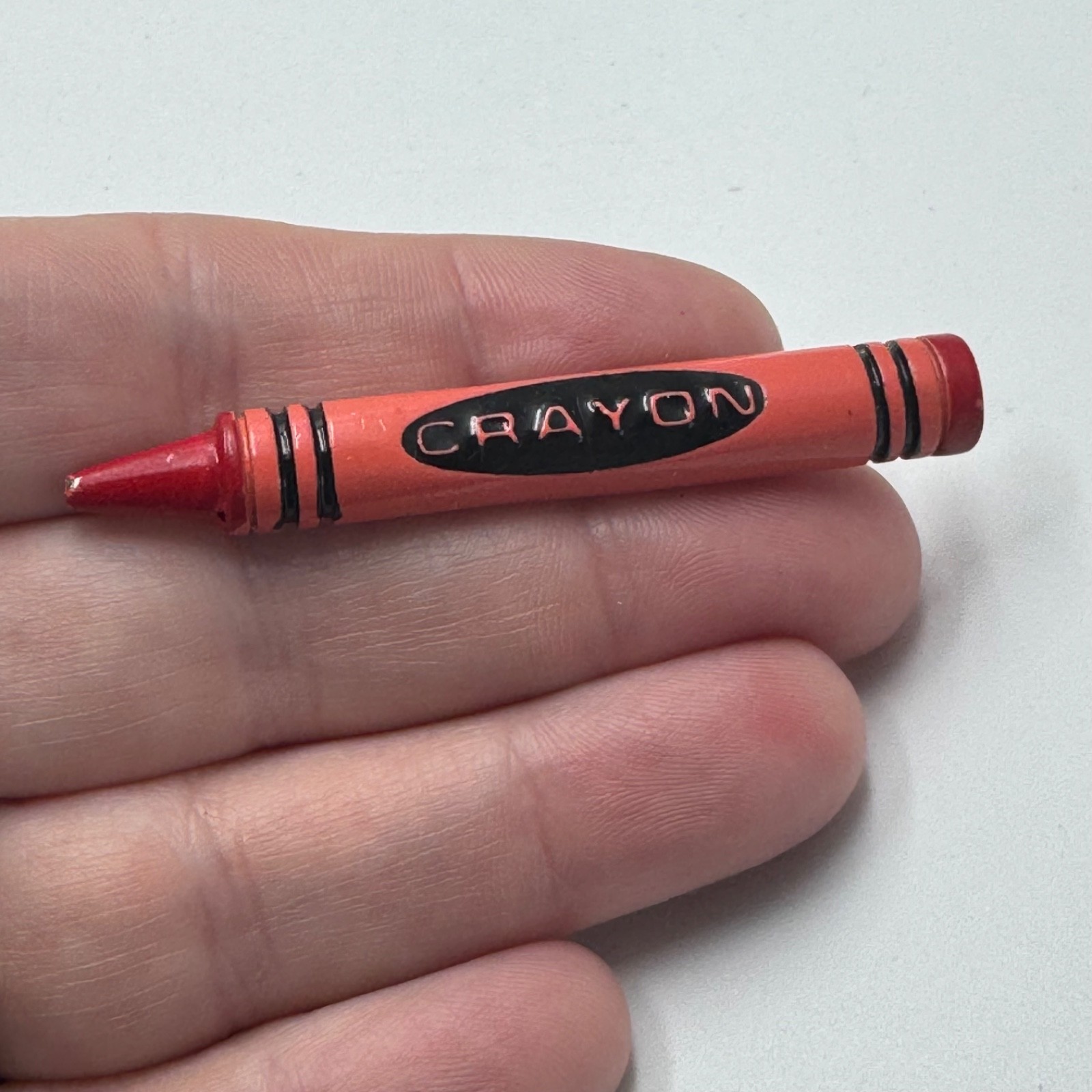 Vintage Crayon Red Orange School Art Logo Brooch Lapel Pin Metal Souvenir