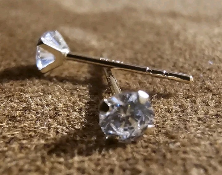 Tiny Round Moissanite Stud Earrings in 10k Yellow Gold