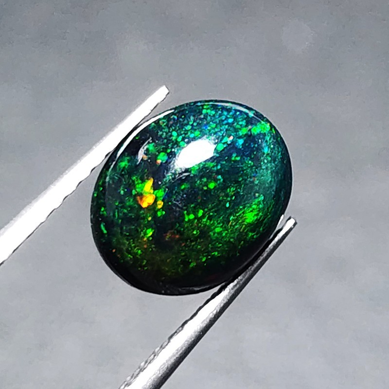 Ethiopian Welo Black Opal AAA+ Oval Cabochon Strong Green Play Loose 1.20Ct Gem