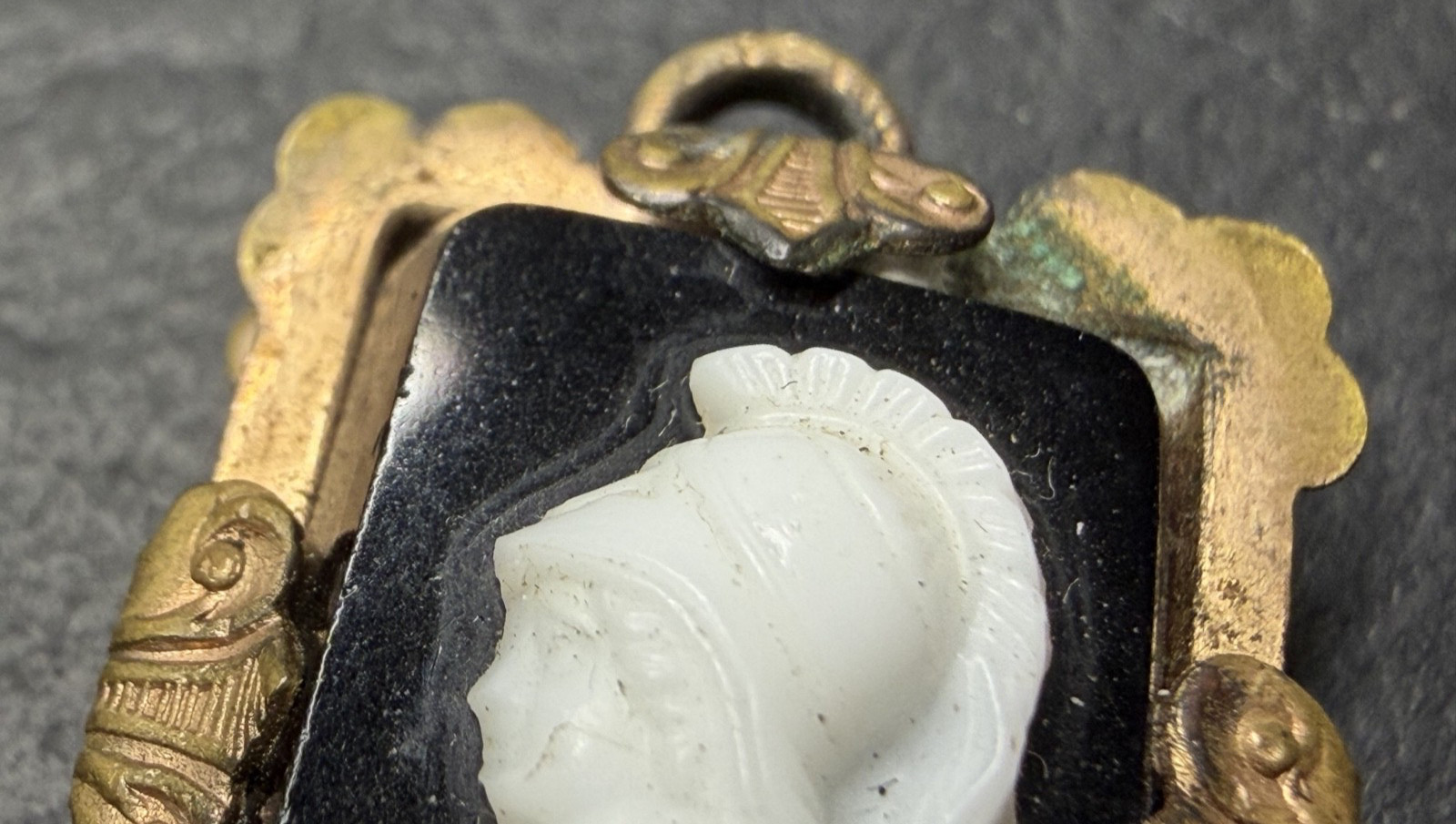 ANTIQUE METAL FOB / PENDANT WITH BLACK & WHITE PROFILE N885