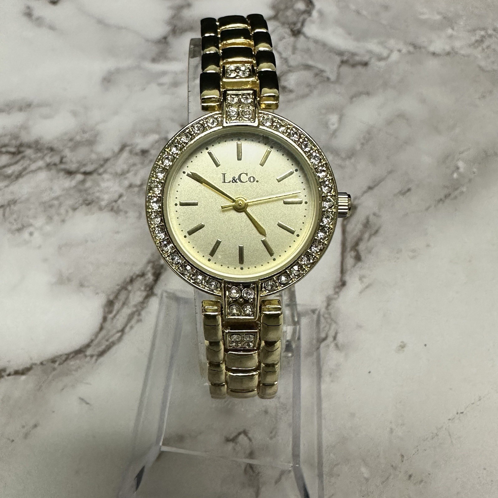 L & Co Watch Women Gold Tone Round Dial Crystal Bezel New Battery 7.25″