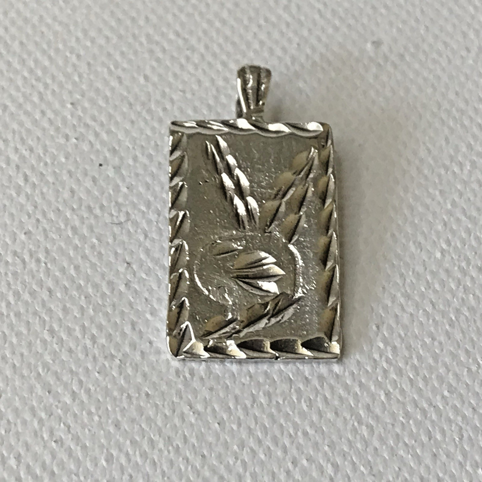 vintage Sterling Silver Playboy Pendant 3grams