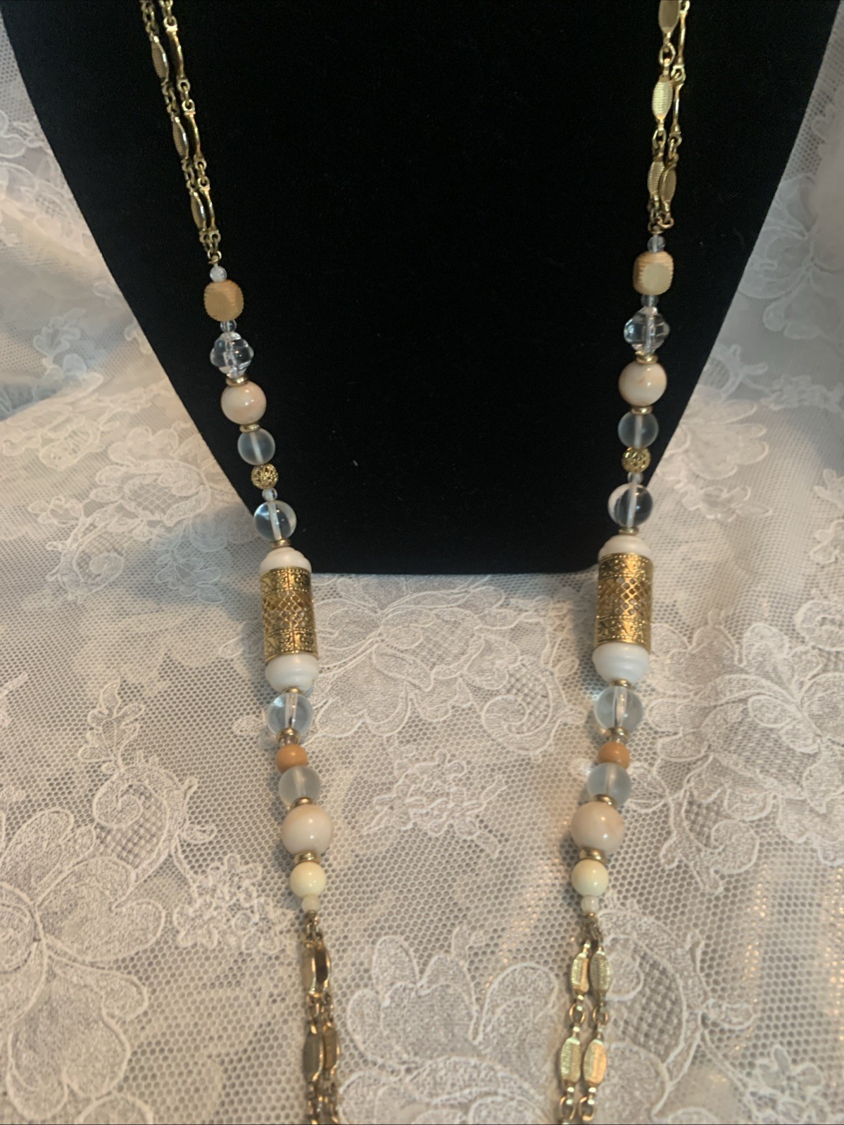 1928 Shiny Gold Tone 36″ Double Chain Necklace Clear, Beige, Gold, Wood Beads