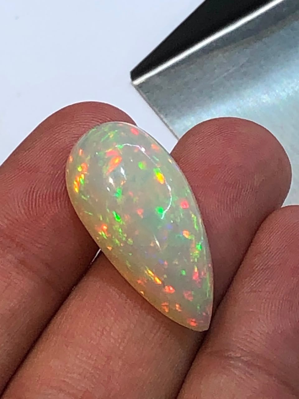 1. 55Ct Natural Ethiopian Welo Opal Pear Cabochon Multi Color Play of Color
