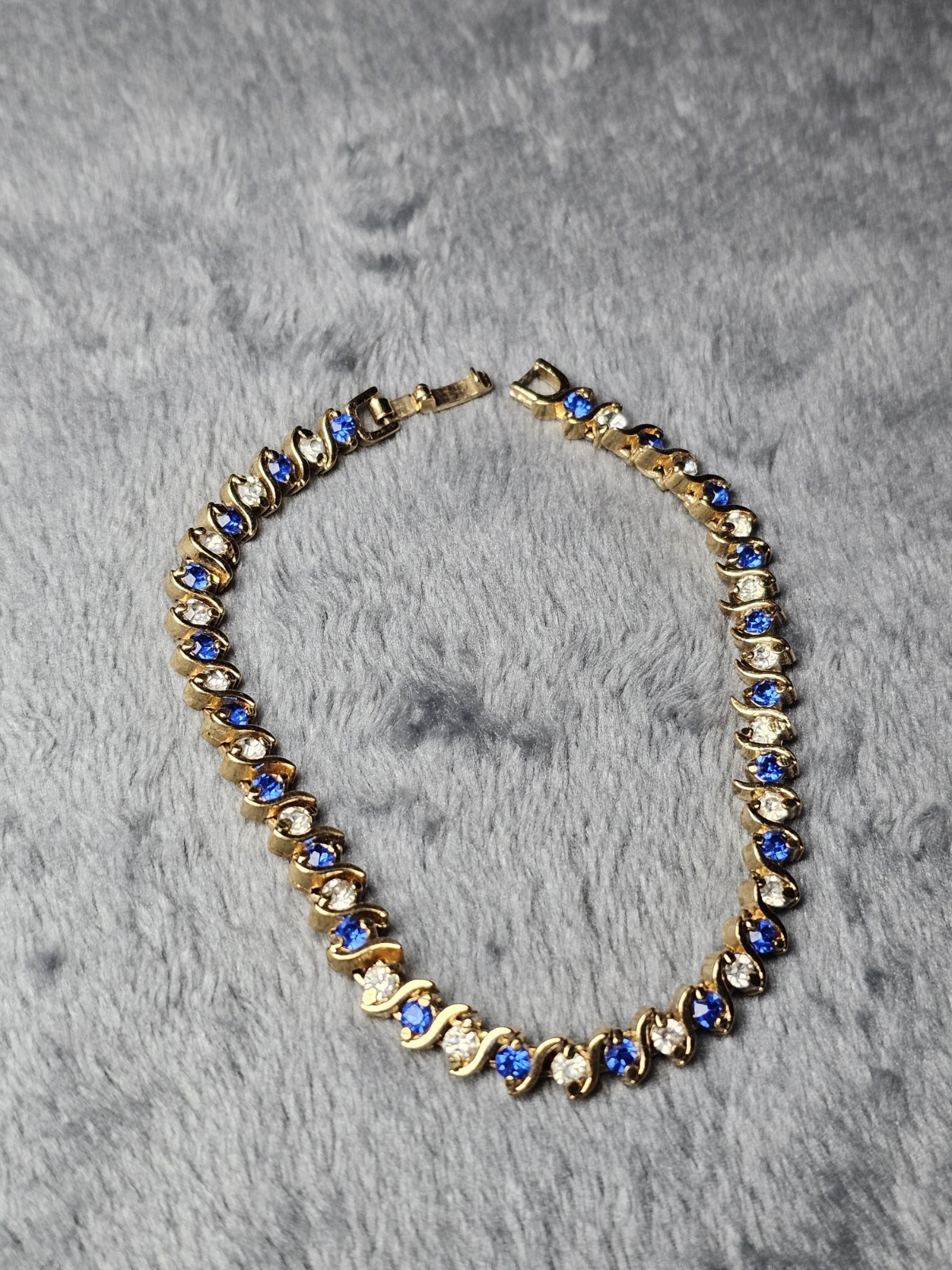 Gold Tone Blue & Clear Rhinestone S-Link Tennis Bracelet Fold-Over Clasp
