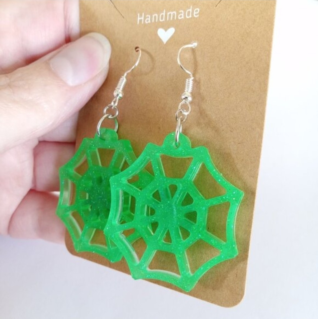 Neon green spider web glow in the dark Halloween dangle earrings new