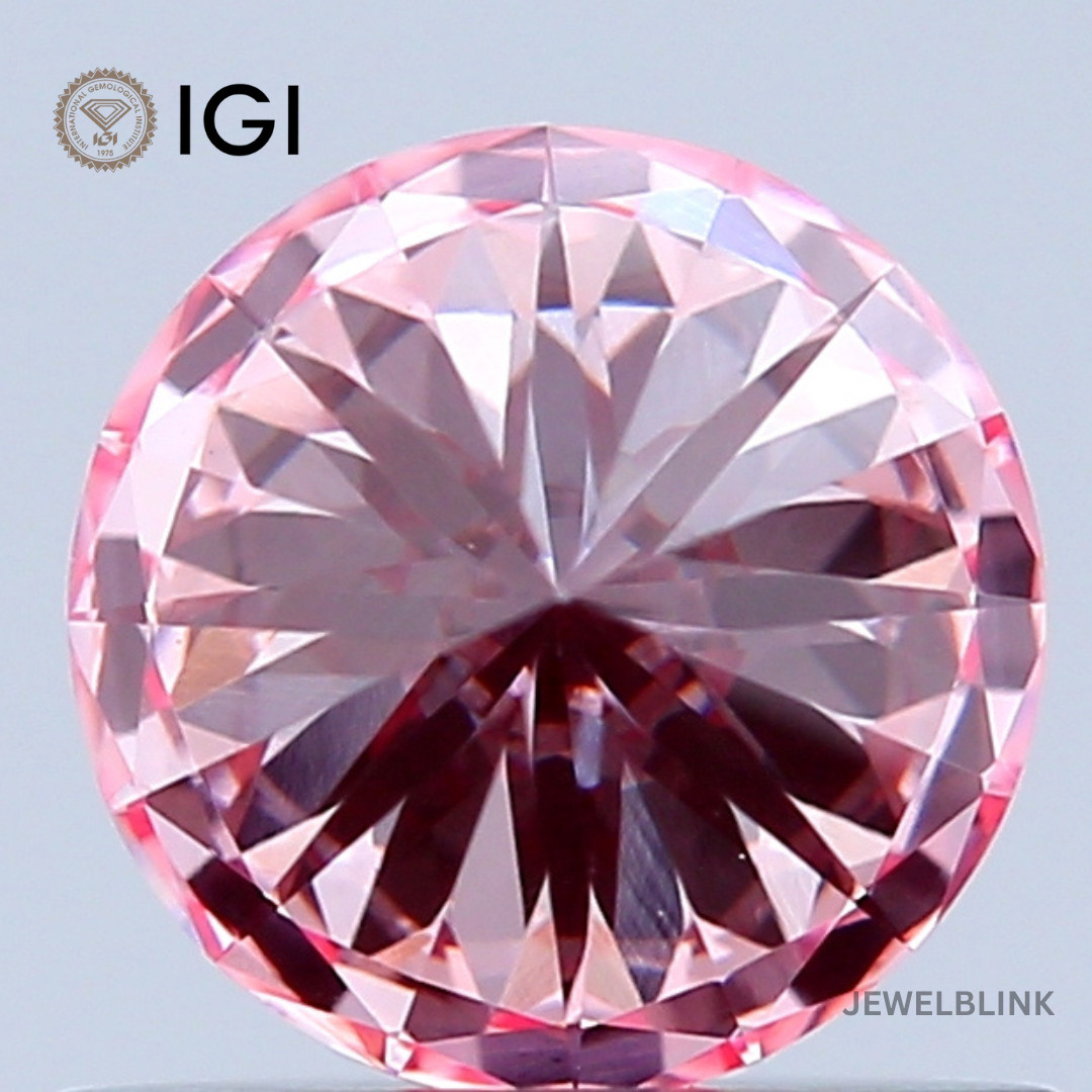 IGI Certified 0.69 Carat Fancy Intense Pink VS1 Round Cut CVD Lab Grown Diamond