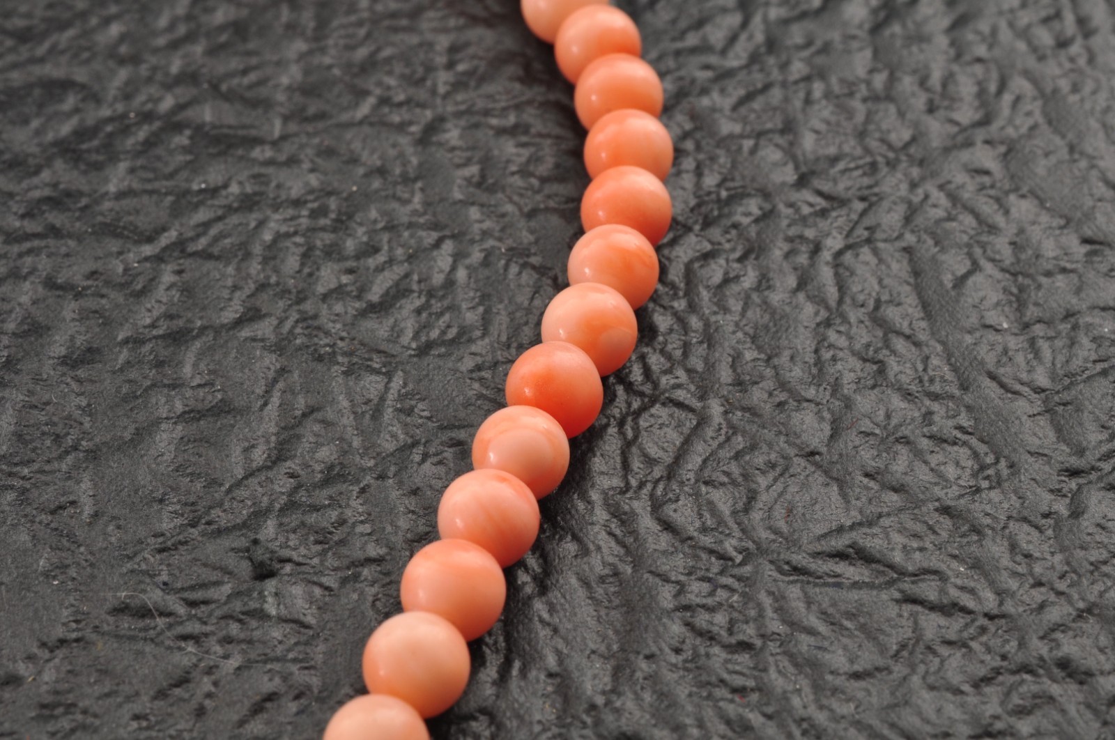 Salmon pink coral Necklace and ear clip set (total 116ct) with Certificate case.