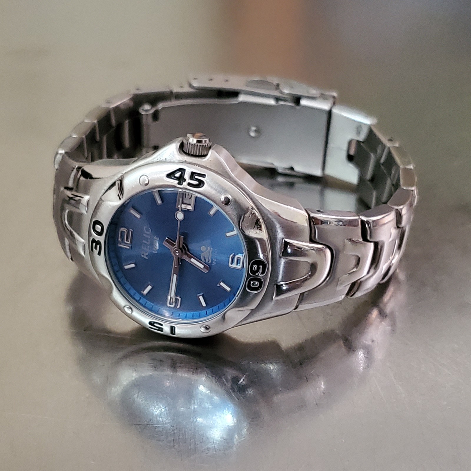 RELIC Wet Watch Women’s Analog Date Blue Dial Rotating Bezel Stainless 6 in 31mm