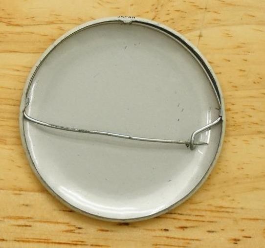 Vintage Metal Pinback Button Japan Tin Litho Flattery Will Get You Anything