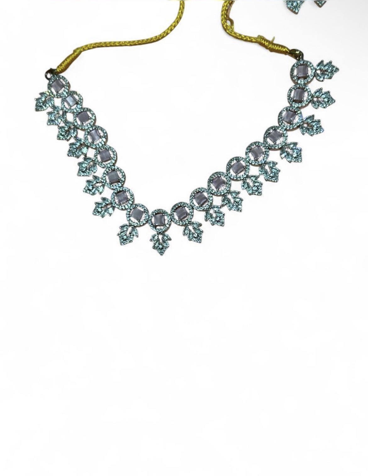 Silver necklace with crystal embellishments and matching earring