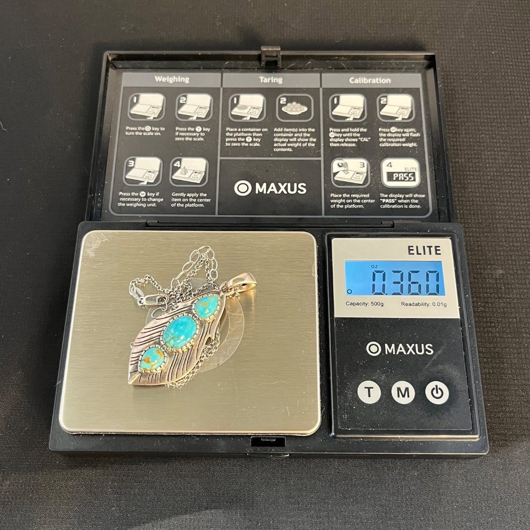 Sterling Silver Necklace with Three Oval Turquoise Colored Stones Feather Pendan