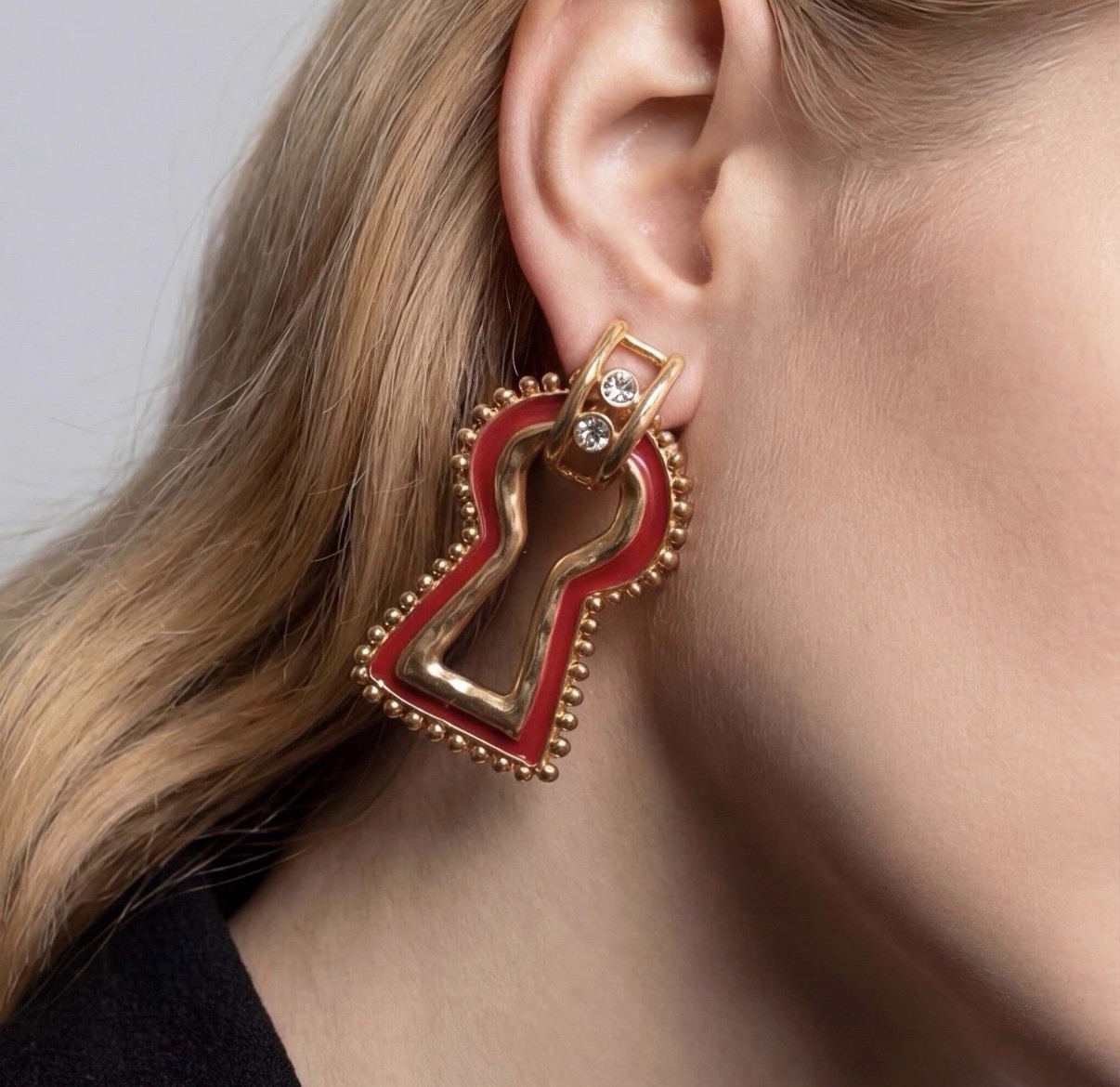 Surrealist, Schiaparelli style, keyhole stud earrings, gold with red enamel