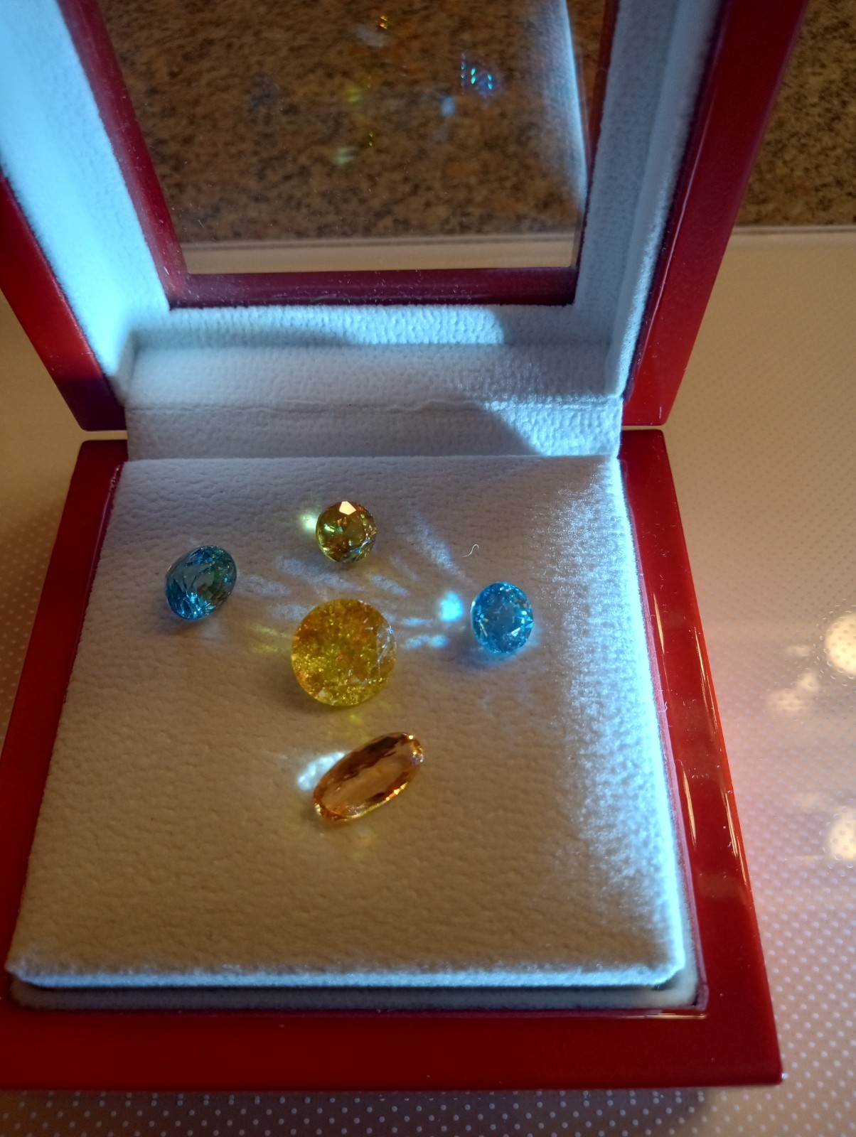 Lot of 5 Loose Gems. 2 Blue Zircons, 1 Sphene, 1 Imperial Topaz, 1 Sphalerite