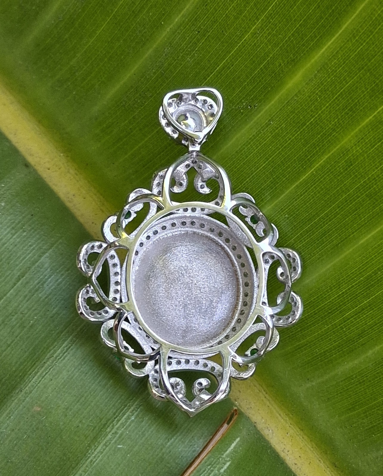 Silver Tone Ornate Scrollwork Oval Pendant Green Oval Cabochon & Accents
