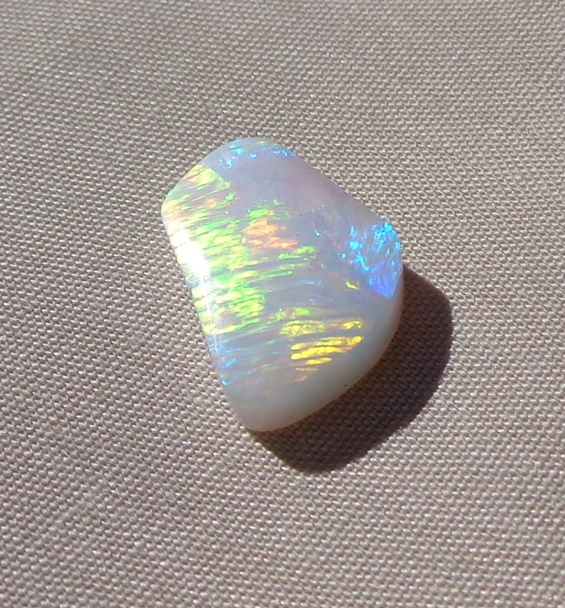 Spencer Idaho Opal Solid 9X15 mm with Unique Pattern and Red, Green, & Gold Fire