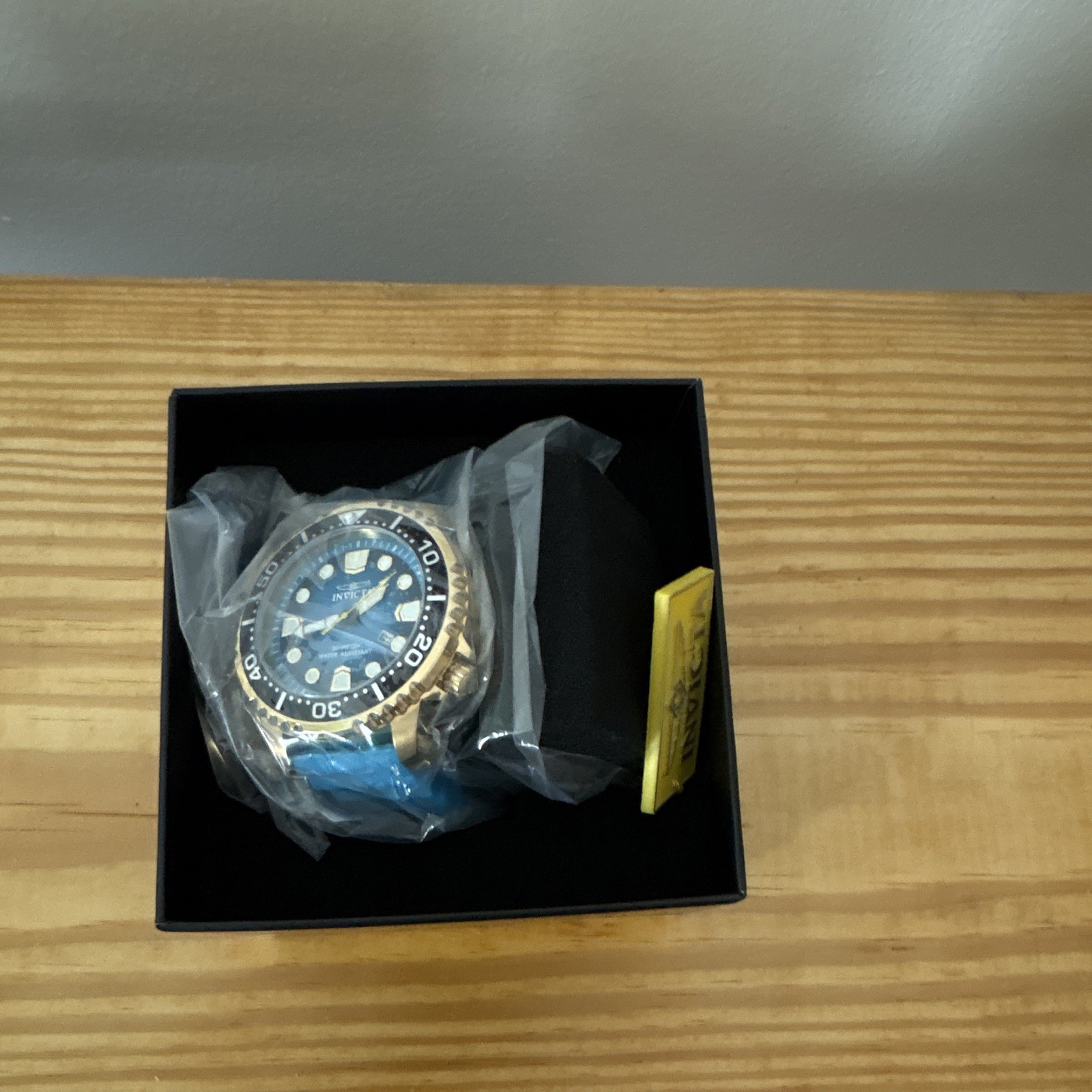 Invicta Men’s Diver Watch Blue Dial Gold Case Blue Band Rotating Bezel Box