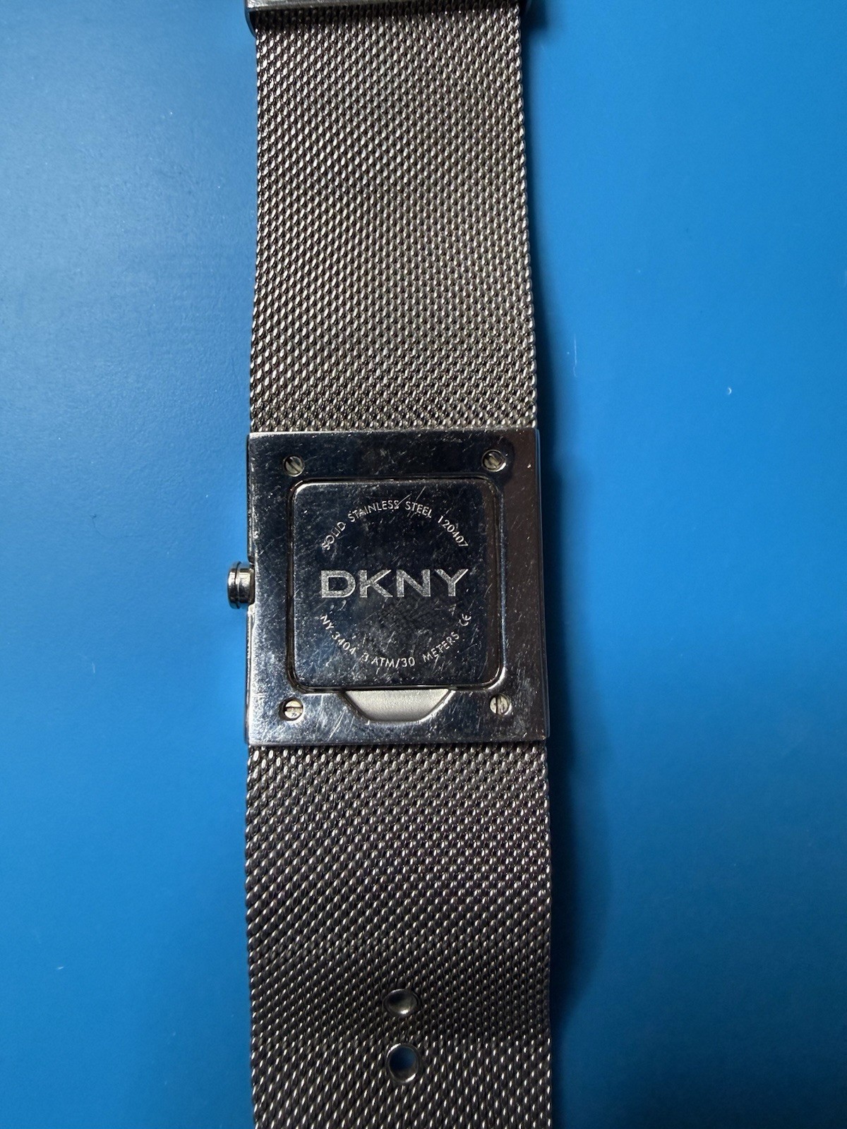 DKNY Women’s Silver Square Dial Mesh Band Quartz Wristwatch 30m