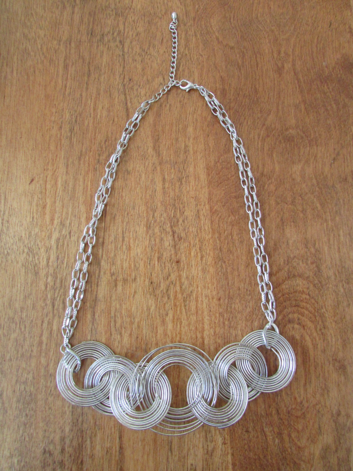 SILVER TONED WIRE LINK COIL AND CHAIN NECKLACE