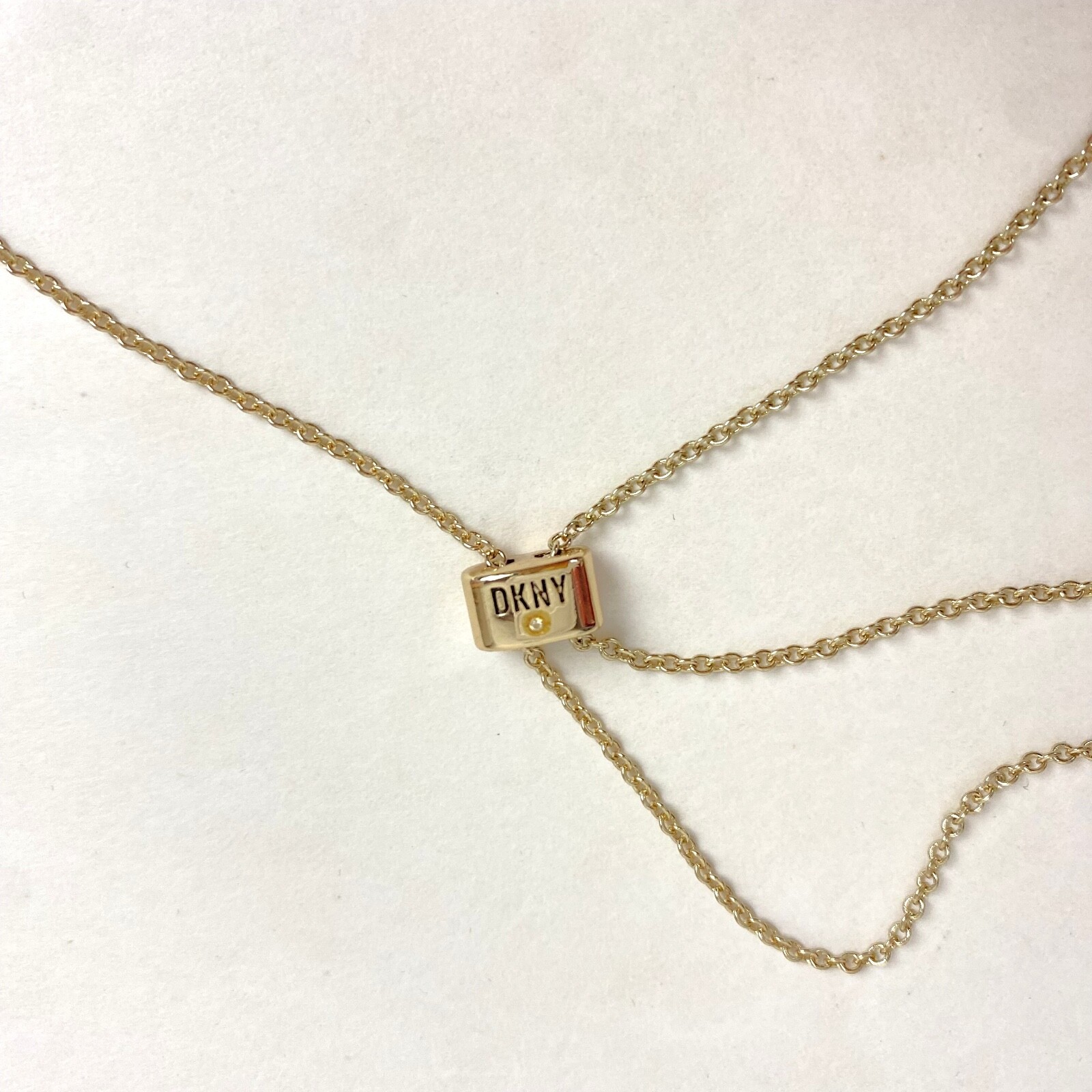 DKNY 38 inch Gold-Tone DD and Circle Chain Ring Pendant Slider Necklace