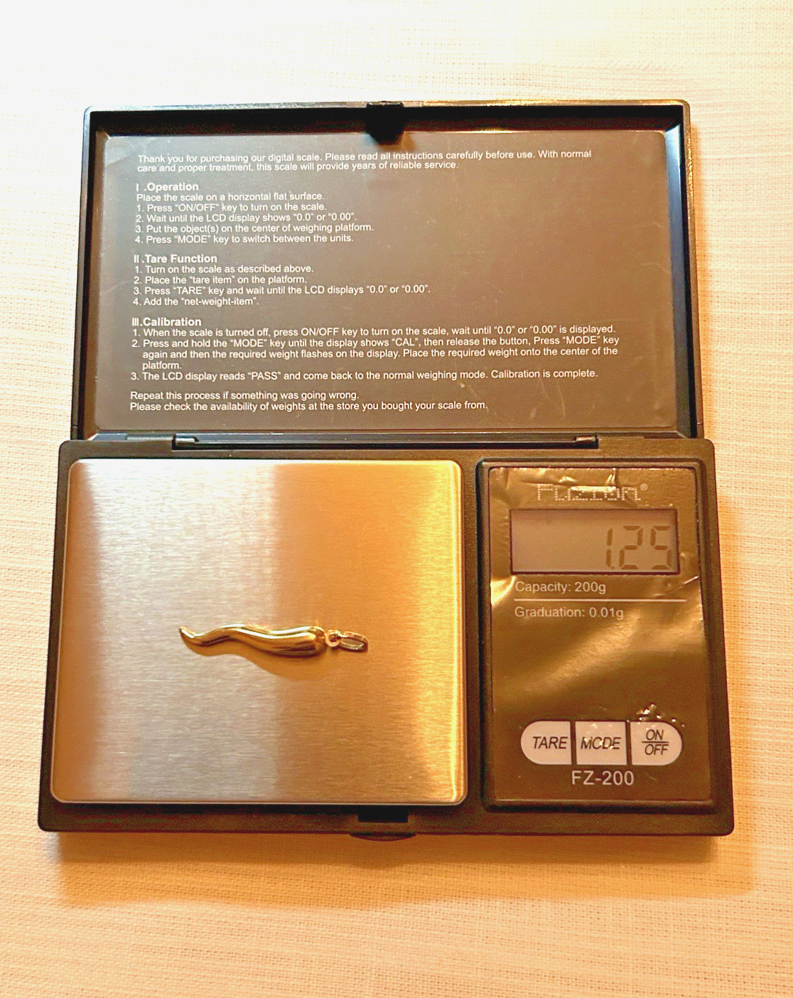 18k solid gold Italian horn weight is 1.2gr. includes 28″ 18K gold Neckless