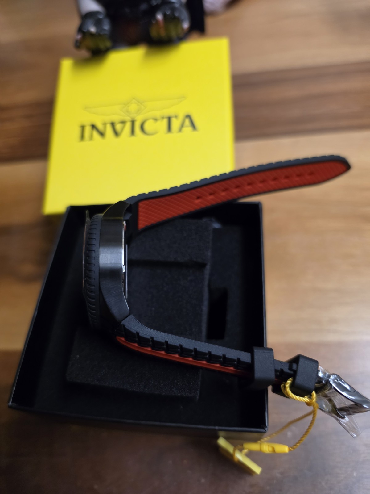 Invicta Men’s Sport Quartz Analog 50mm 50m Black/Red Dial Orange Strap Box
