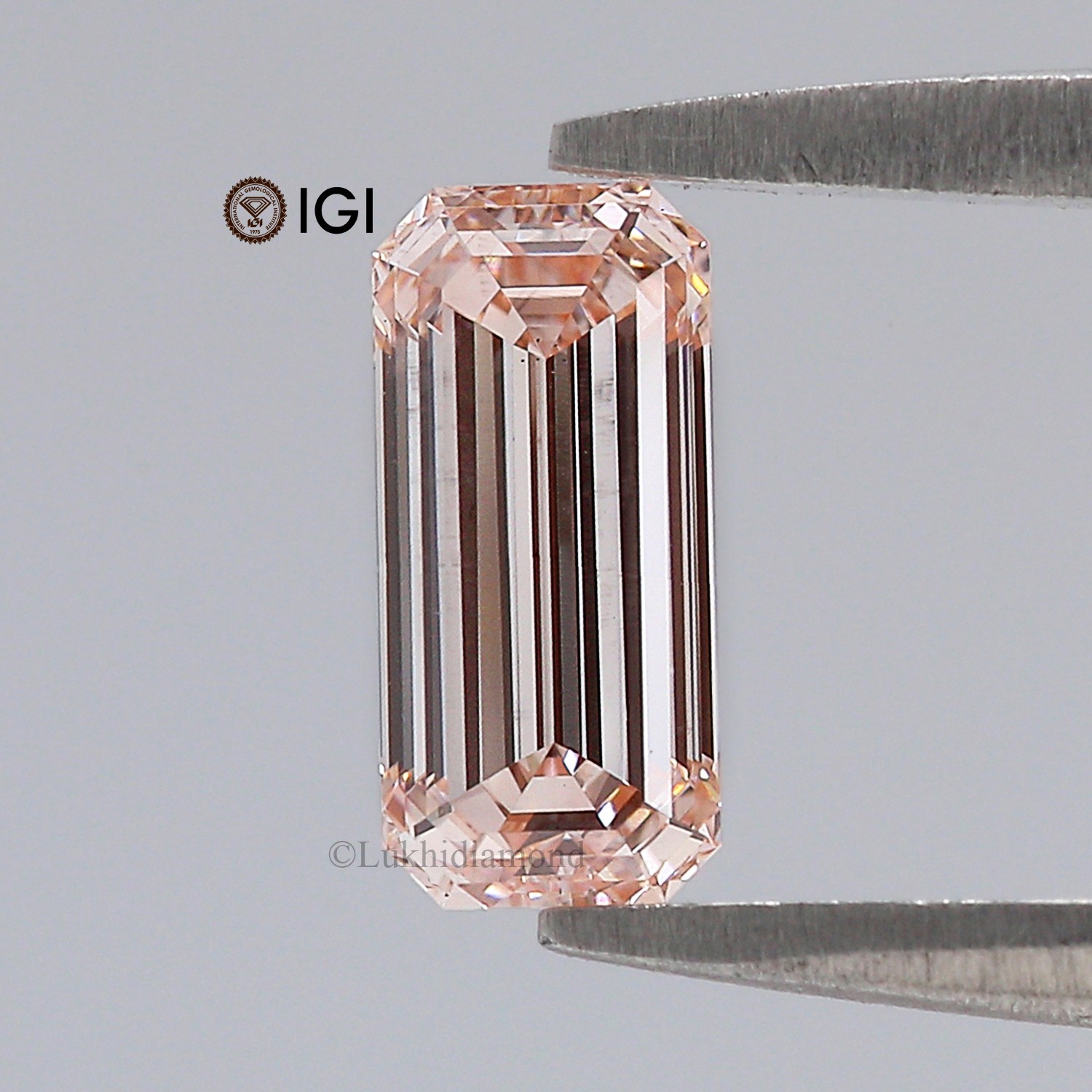0.84 CT IGI Certified Emerald Cut Fancy Pink Color VS2 Clarity Lab Diamond