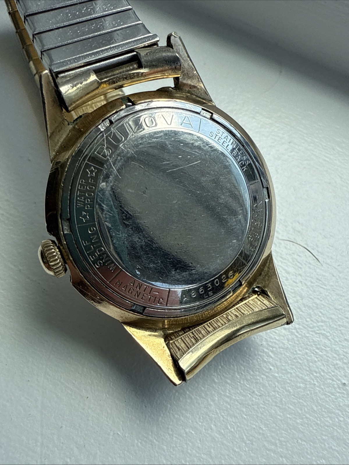 Vintage Bulova 23 Jewels White Sunburst Dial Stretch Band Excellent Works