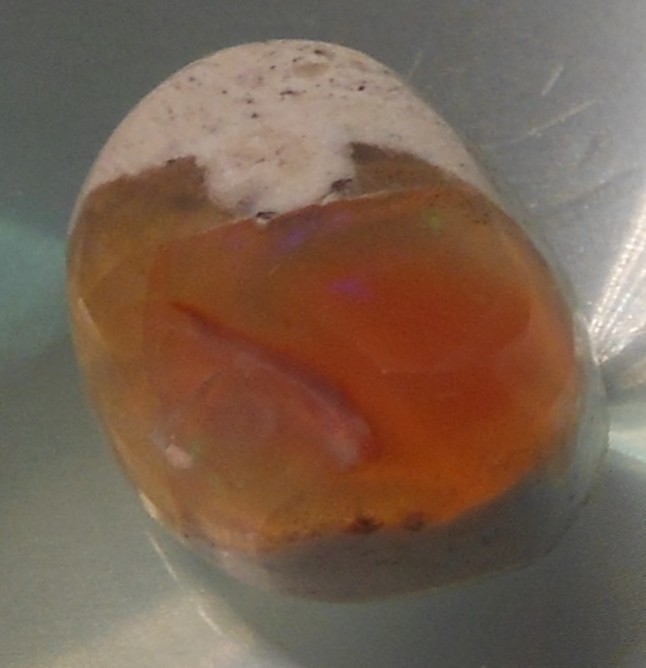 8.70 carats Mexican Fire Opal Freeform shape 15x11x8mm (approx)
