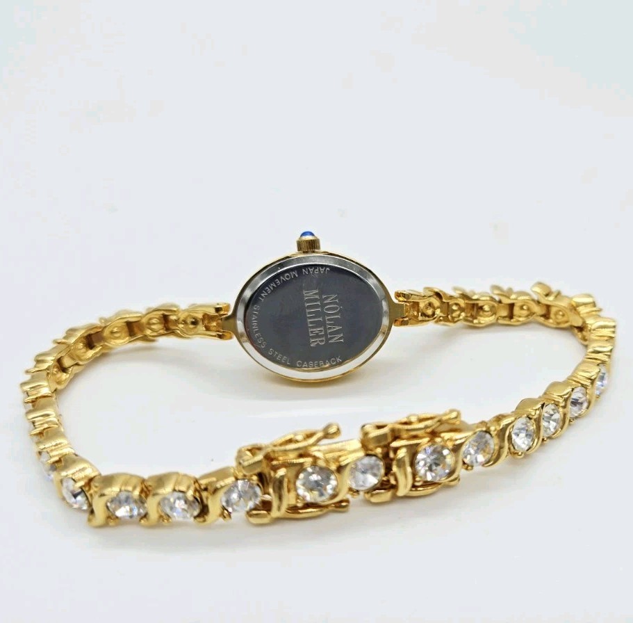 Nolan Miller Watch Tennis Bracelet Crystal Gold tone New battery Oval 7.25 in