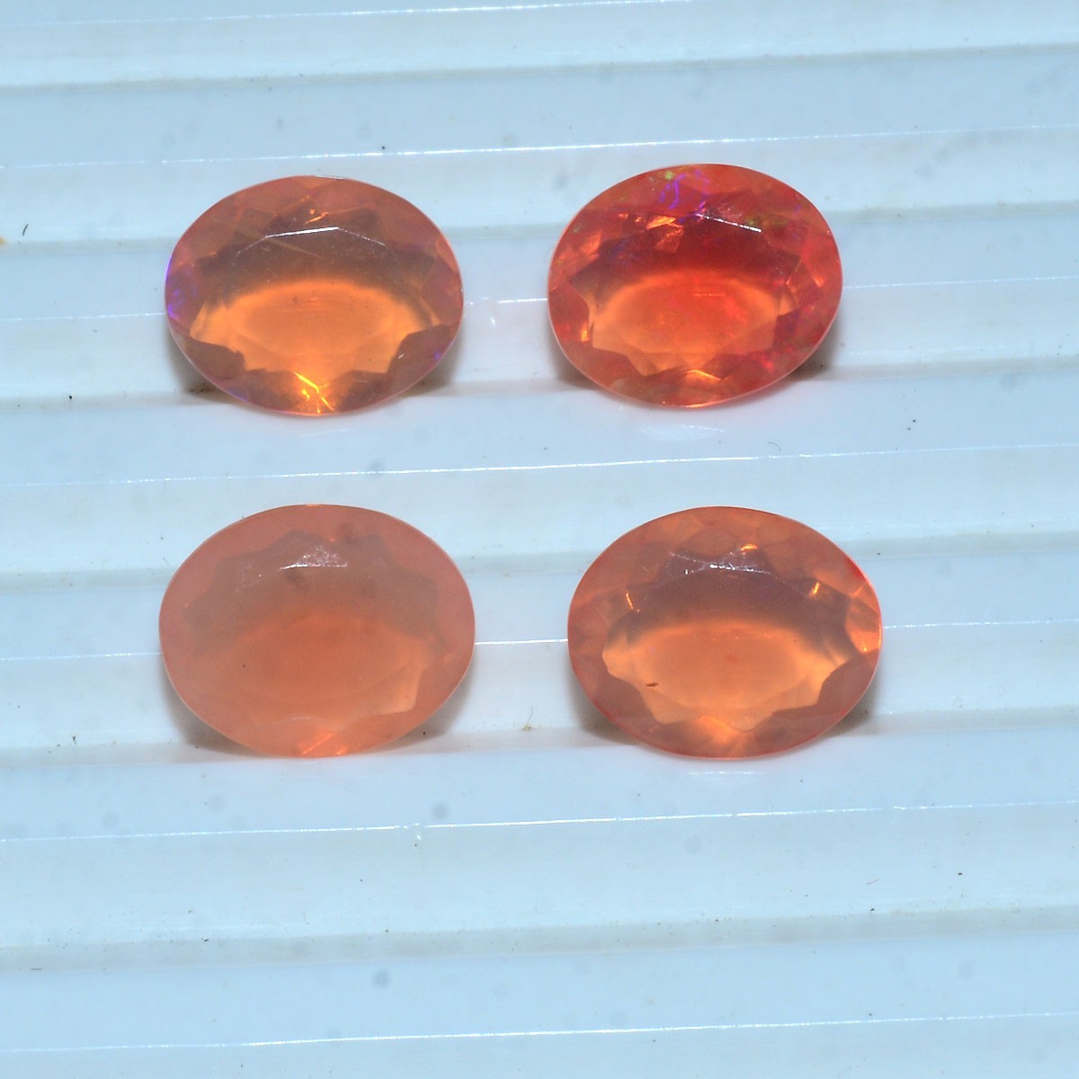 4 Pcs Natural Ethiopian Opal 10mmx8mm Play Of Colors Oval Faceted Cut Gemstones