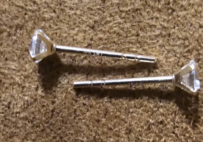 Tiny Round Moissanite Stud Earrings in 10k Yellow Gold