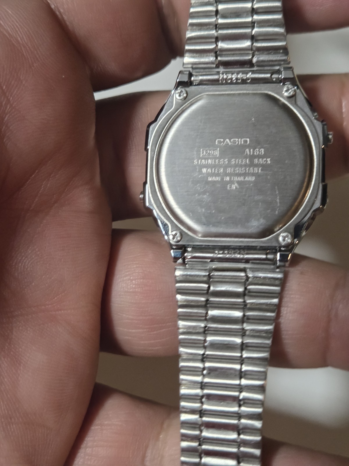 Casio A168WA-1W Digital Alarm Stainless Steel Illuminator Watch A168WA-1 C135B